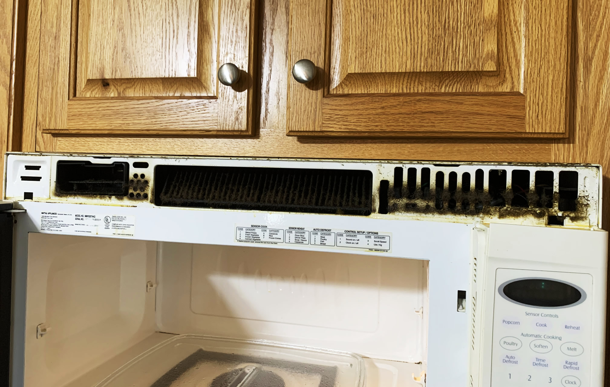 Microwave with Exhaust Fan might have an additional top air filter and It needs cleaning as well